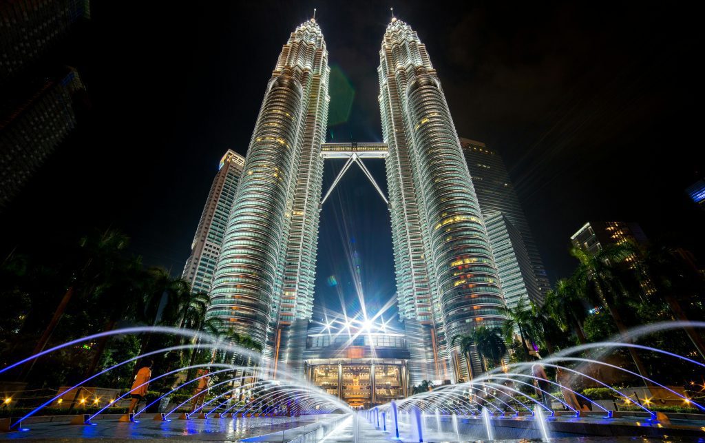 Petronas Twin Towers illuminated at night in Kuala Lumpur Malaysia
