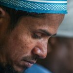 Muslim man praying during a moment of spiritual reflection